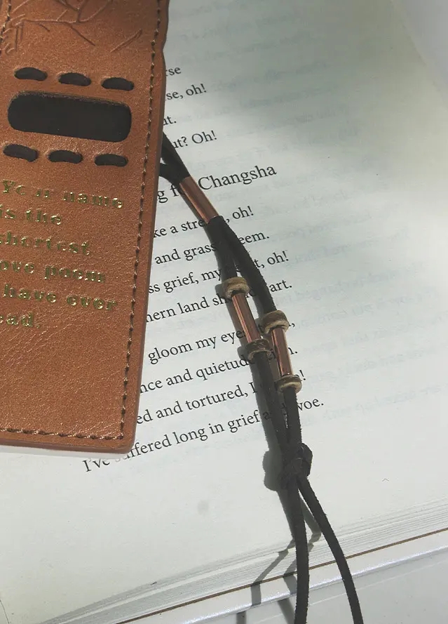 Reference for threading beads onto the bookmark cords